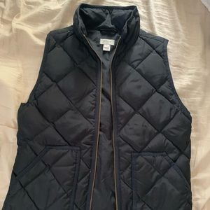 J crew black puffer vest.
